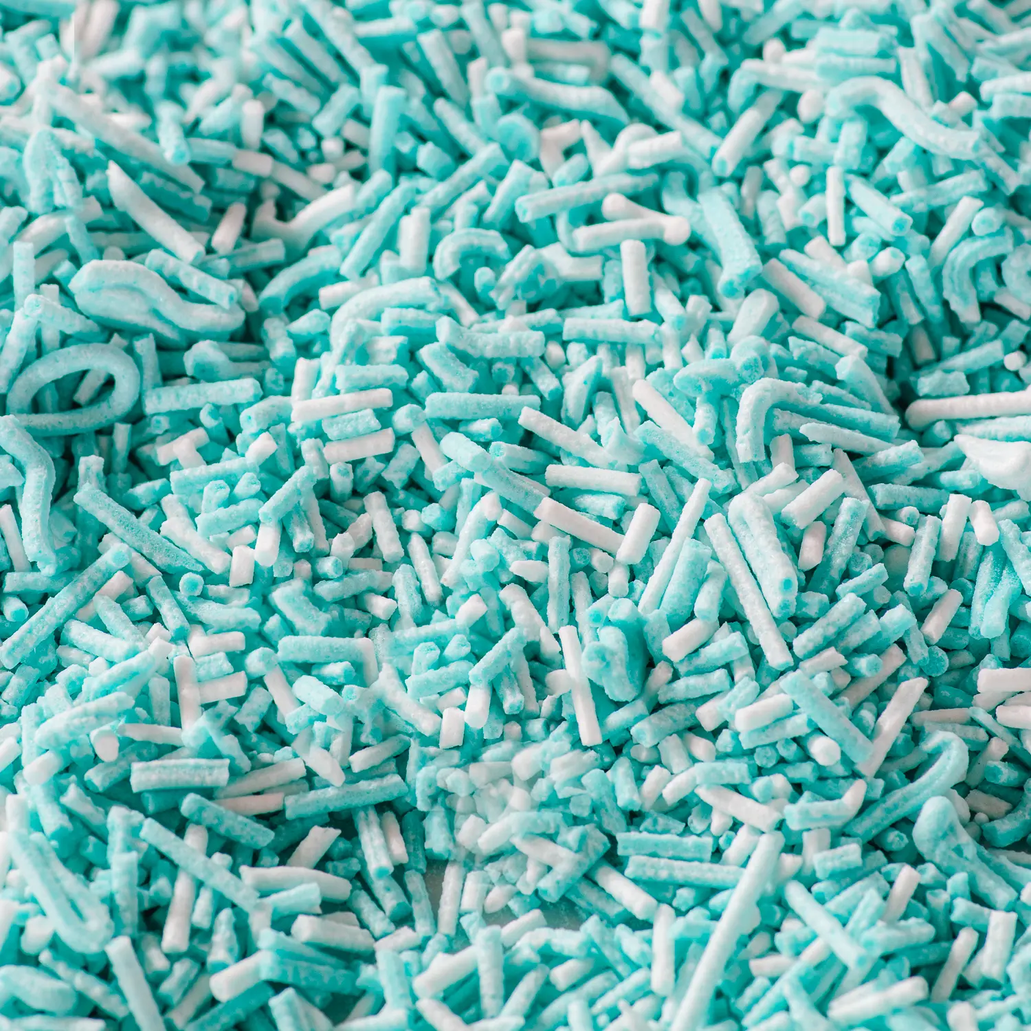 Magnified photo of blue and white sprinkles