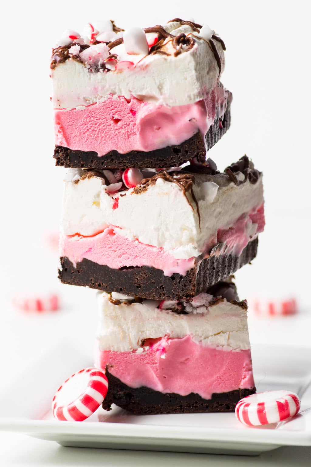 A stack of low carb peppermint ice cream bars on a plate.