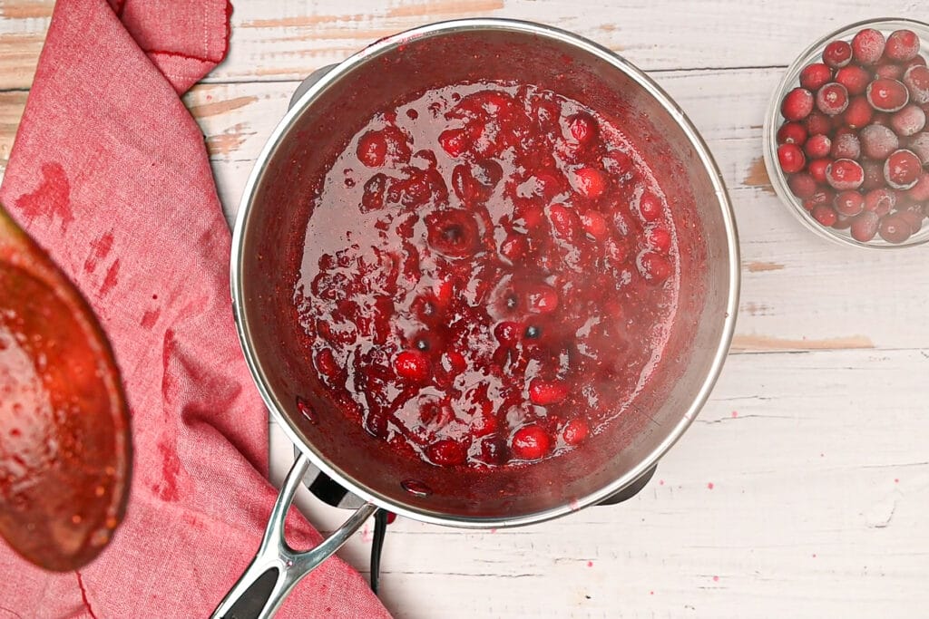 Cranberries and liquid have reduced to make a sauce.