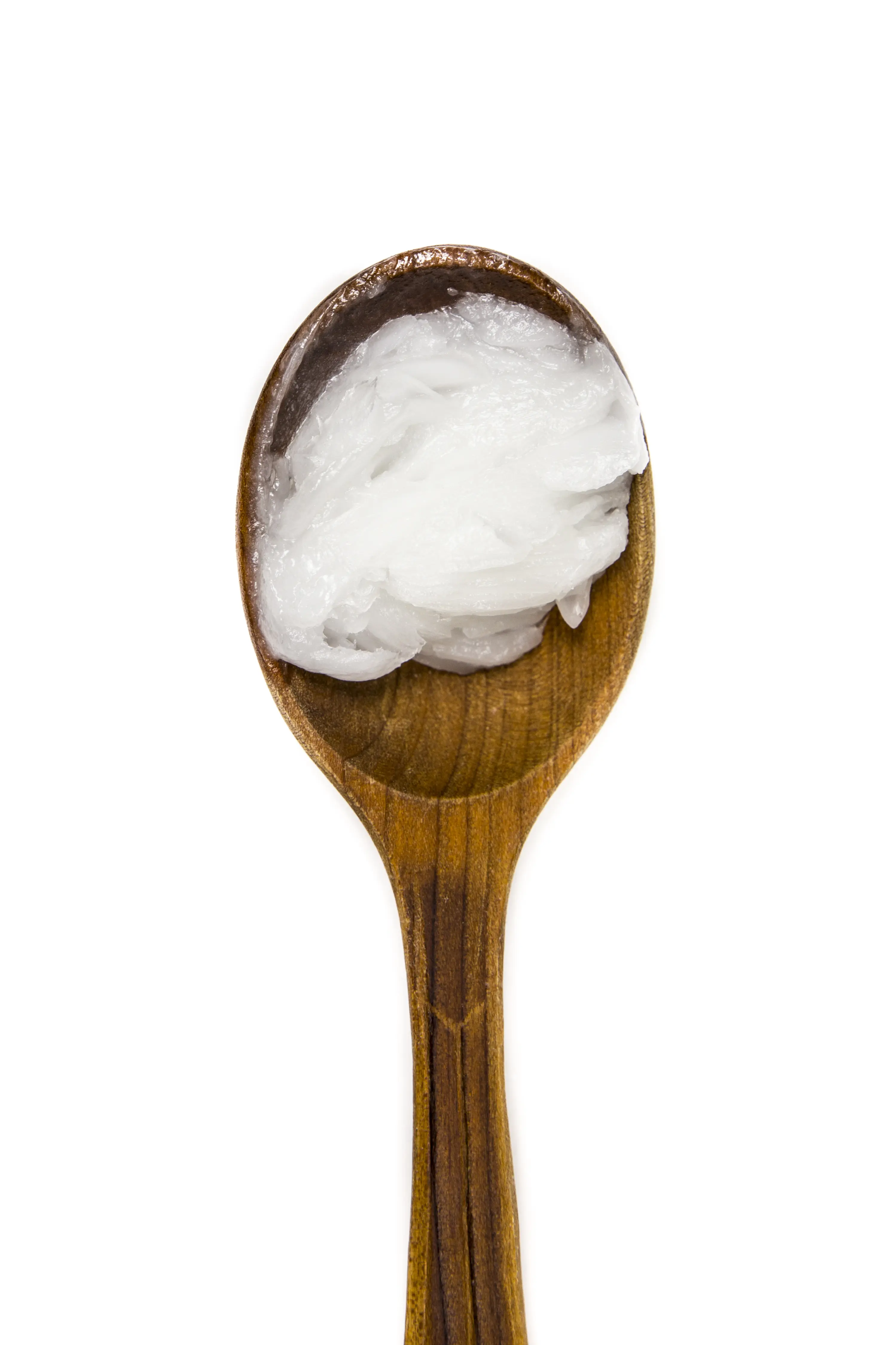 Coconut on a wooden spoon against an isolated white background.