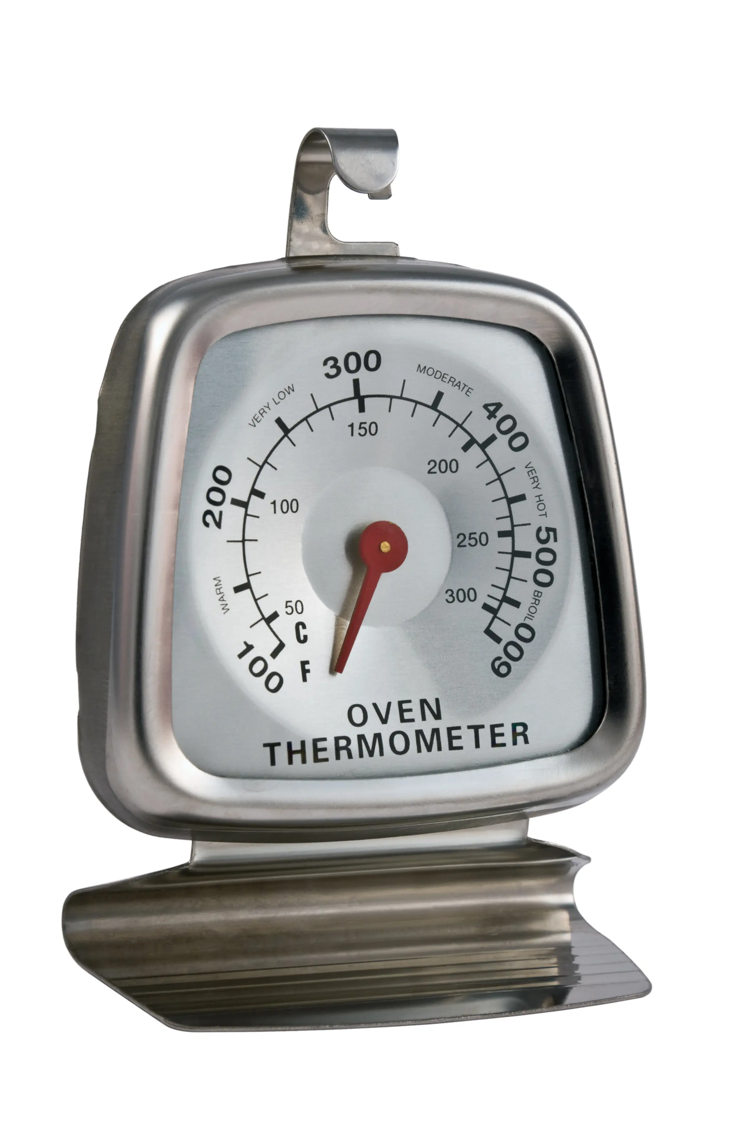 An oven thermometer on a bright white back background